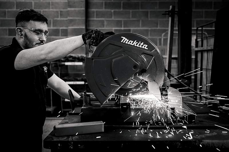 image of man operating circular saw