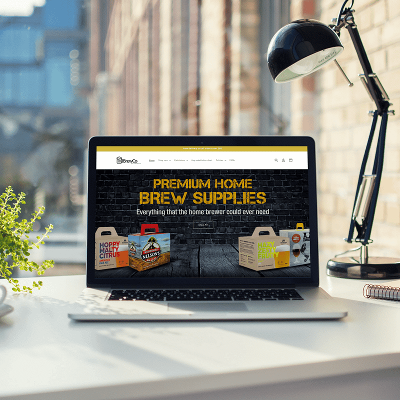 Laptop computer displaying homepage for BrewCo website