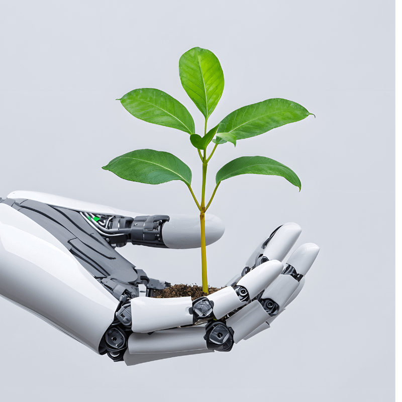 robotic hand holding tiny tree
